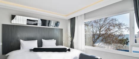 Literie de qualité supérieure, mini-bar avec articles gratuits