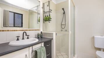 Shower, hair dryer, towels, soap