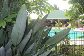Outdoor pool - 900m from the beach, the Bagatelle gites ** 2/4 pers, swimming pool and SPA (Sainte-Rose)