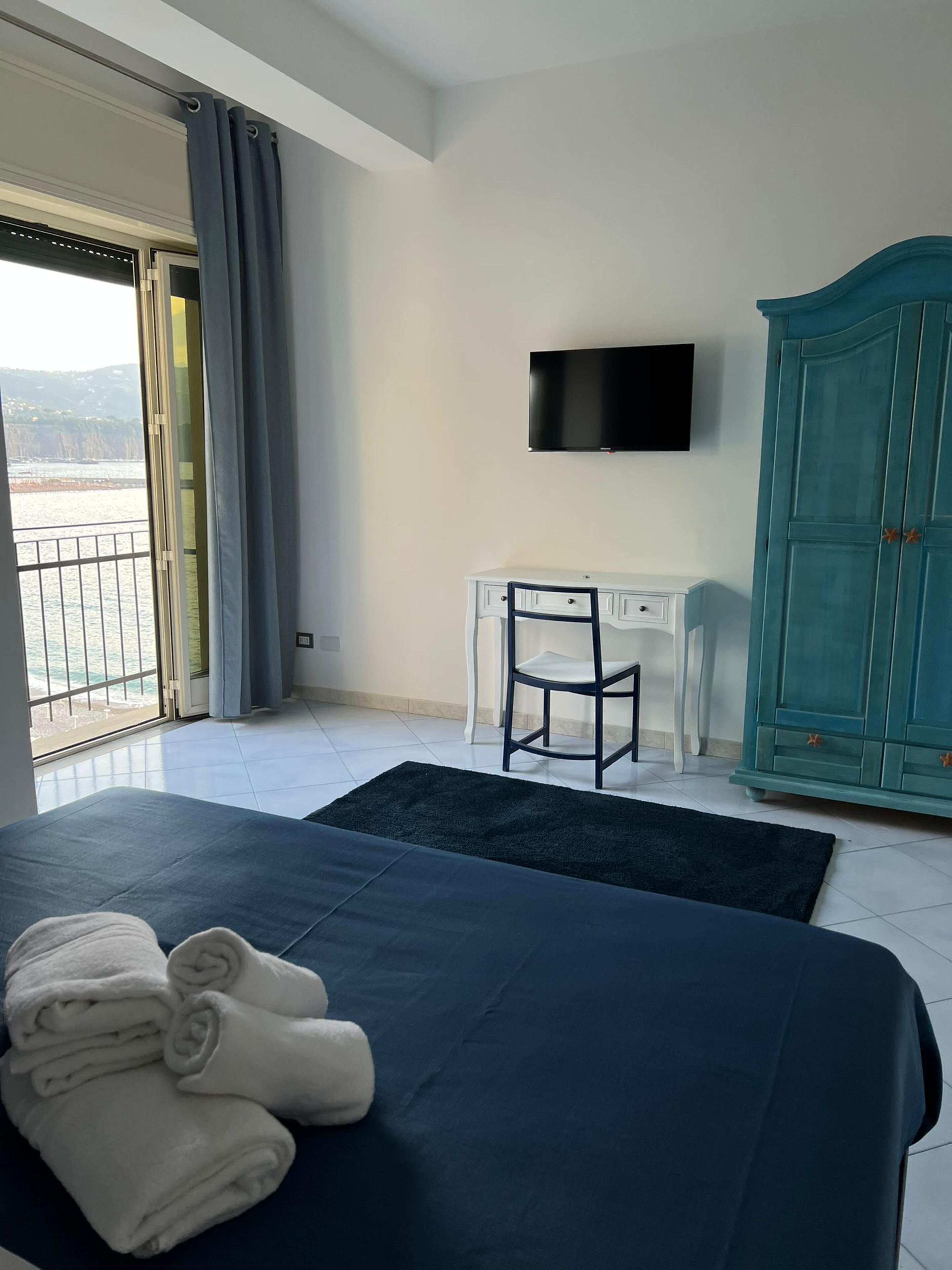 Casa ejecutiva | Edredón, camas con pillow-top y caja de seguridad en la habitación 