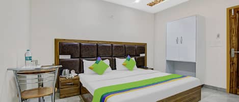 Economy Room | Desk, iron/ironing board