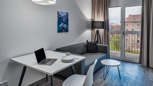 50-inch flat-screen TV with cable channels, TV - NorthApartments Dresden Am Park (Dresden)