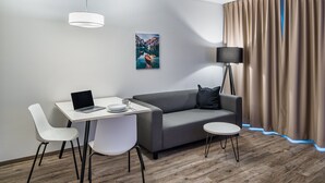 50-inch flat-screen TV with cable channels, TV - NorthApartments Dresden Am Park (Dresden)