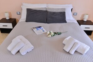 Blackout curtains, iron/ironing board, free WiFi, bed sheets