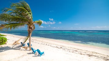 On the beach, sun loungers, beach towels