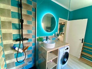 Shower, hair dryer, towels, soap