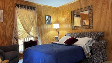 1 bedroom, desk, iron/ironing board, travel crib