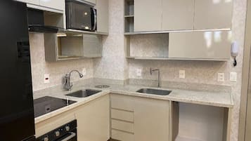 Basic Apartment | Private kitchen | Full-sized fridge, microwave, stovetop, toaster