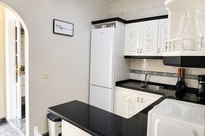 Coffee/tea maker, fridge, microwave, electric kettle