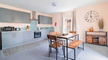 Apartment, 2 Bedrooms | Living area | 28-inch LCD TV with digital channels, TV