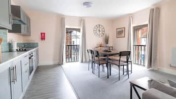 Apartment, 2 Bedrooms | Living area | 28-inch LCD TV with digital channels, TV
