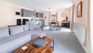 Apartment | Living area | 28-inch LCD TV with digital channels, TV - The Windmill (Alford)