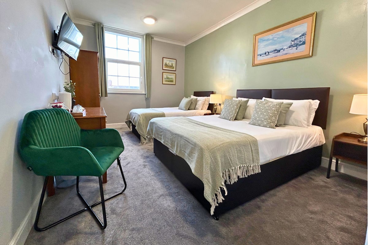 Desk, laptop workspace, free WiFi, bed sheets