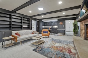 Smart TV, fireplace, books