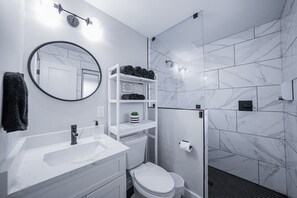Shower, hair dryer, towels, soap
