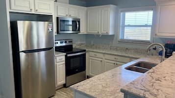 Condo, 2 Bedrooms | Private kitchen | Fridge, oven, coffee/tea maker, toaster