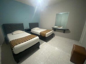 Basic Twin Room | Bed sheets - HOTEL DUBAI (Monterrey)