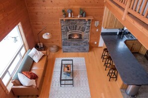 Smart TV, fireplace, foosball, books