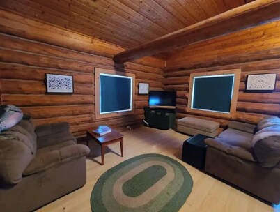 Full scribe log cabin with wood stove and kitchen