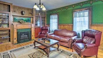 TV, fireplace, books
