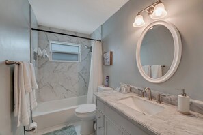 Shower, jetted tub, free toiletries, hair dryer