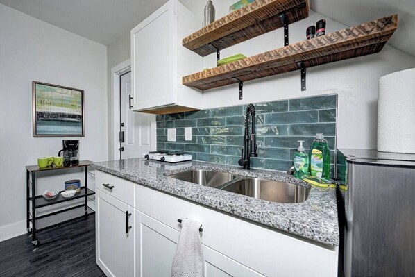 Fridge, microwave, stovetop, coffee/tea maker