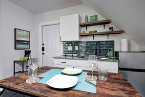 Fridge, microwave, stovetop, coffee/tea maker