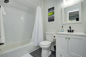 Hair dryer, towels, soap, toilet paper