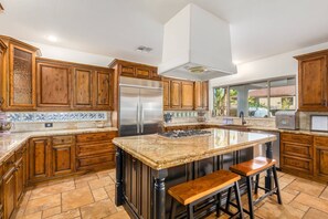 Cook your favorite dishes in this fully equipped kitchen - 5BR Mesa Home 4600 sq.ft | Pool, Hot Tub, Putting Green, In-Ground Trampoline, Half Court Basketball (Mesa)