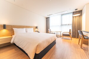 Desk, laptop workspace, free WiFi, bed sheets