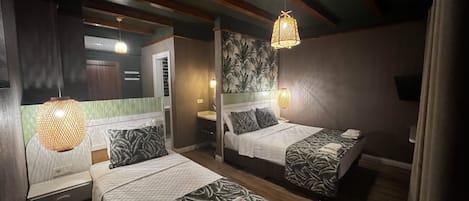 Habitación Deluxe con 1 cama matrimonial o 2 individuales | Sábanas de algodón egipcio, ropa de cama de alta calidad y minibar