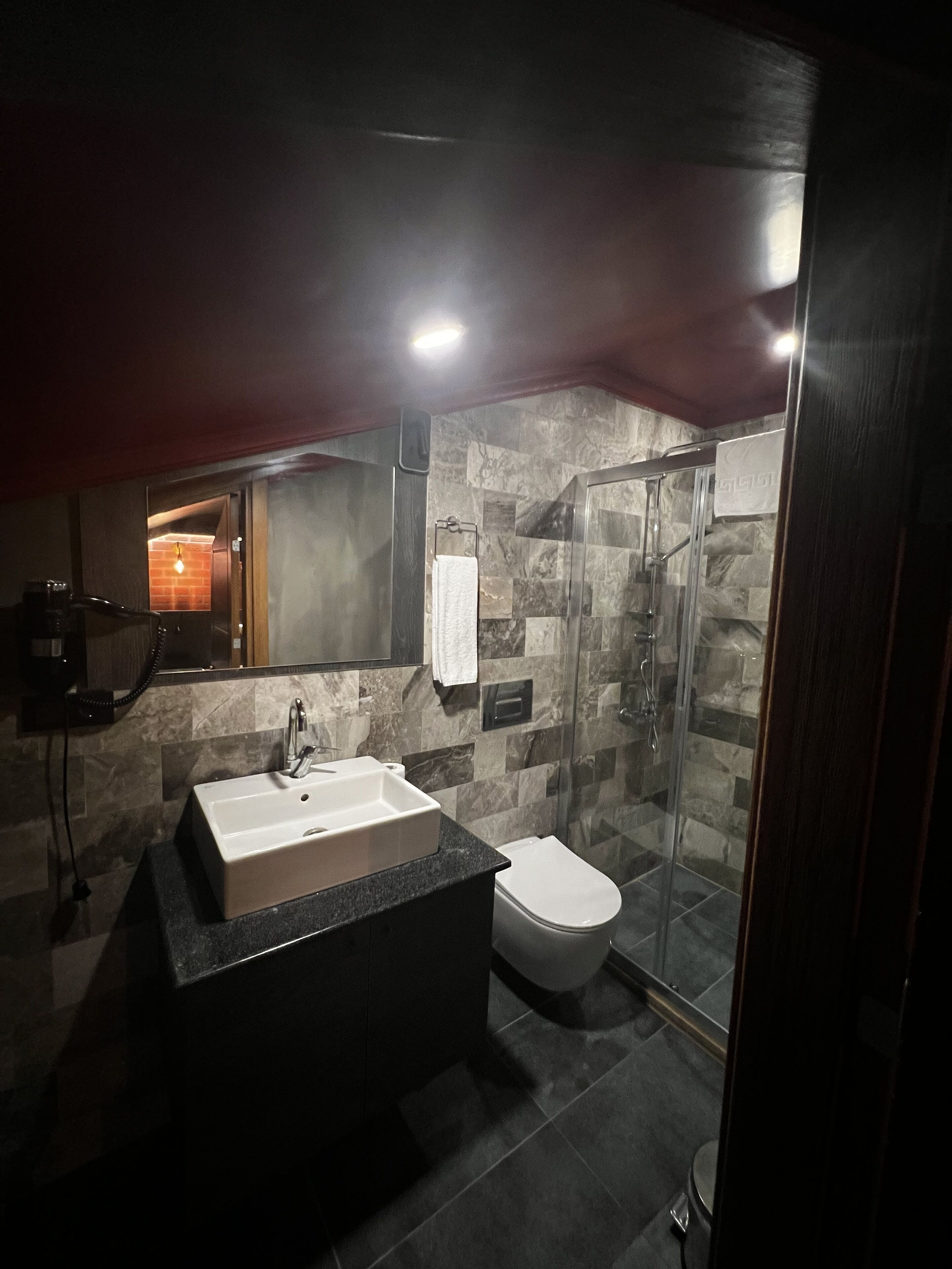 economy double or twin room | bathroom | shower, rainfall showerhead, hair dryer, slippers