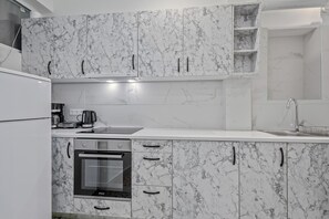 Comfort Apartment | Private kitchen | Espresso maker, full-size fridge, oven, stovetop - Athens Plaka Family Suites (Athens)