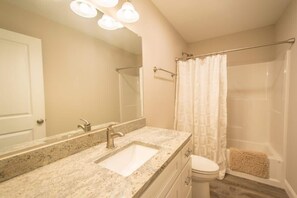 Combined shower/tub, hair dryer