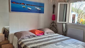 1 chambre, fer et planche à repasser, Wi-Fi gratuit, draps fournis