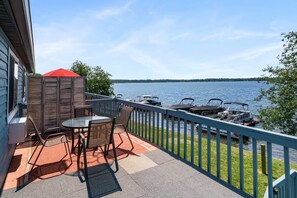 Outdoor dining - Rustic lakeside condo on Fife Lake with fully equipped kitchen and balcony (Fife Lake)
