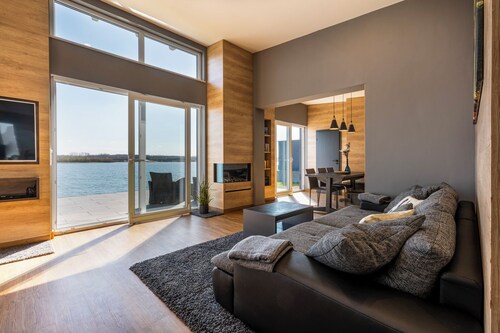 Dream house/private beach 120m², sauna, air conditioning,terrace,garden,barbecue,boat