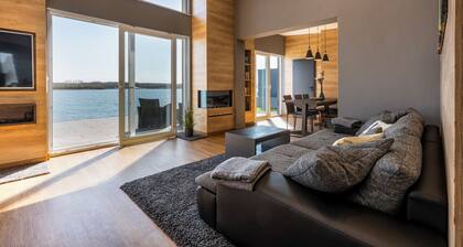 Dream house/private beach 120m², sauna, air conditioning,terrace,garden,barbecue,boat