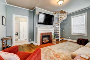 Smart TV, fireplace, books