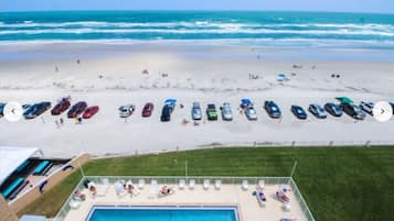 On the beach, sun loungers, beach towels