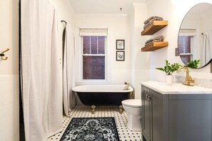 Bathtub, hair dryer, towels