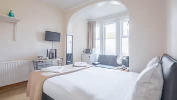 Classic Double Room | Desk, blackout drapes, iron/ironing board, free cribs/infant beds