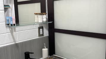 Shower, towels, soap, shampoo