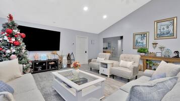 Smart TV, fireplace, table football, books