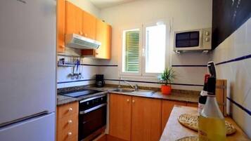 Réfrigérateur, micro-ondes, four, lave-vaisselle