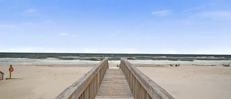 On the beach, sun-loungers