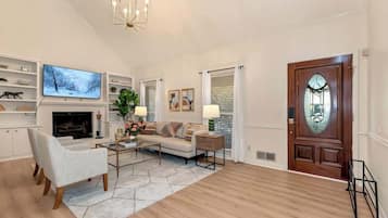 TV, fireplace, books, offices