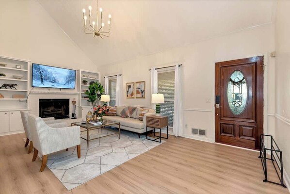 TV, fireplace, books, offices