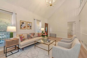 TV, fireplace, books, offices