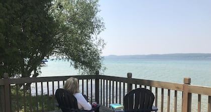 East Torch Lake cottage with beautiful sunsets!